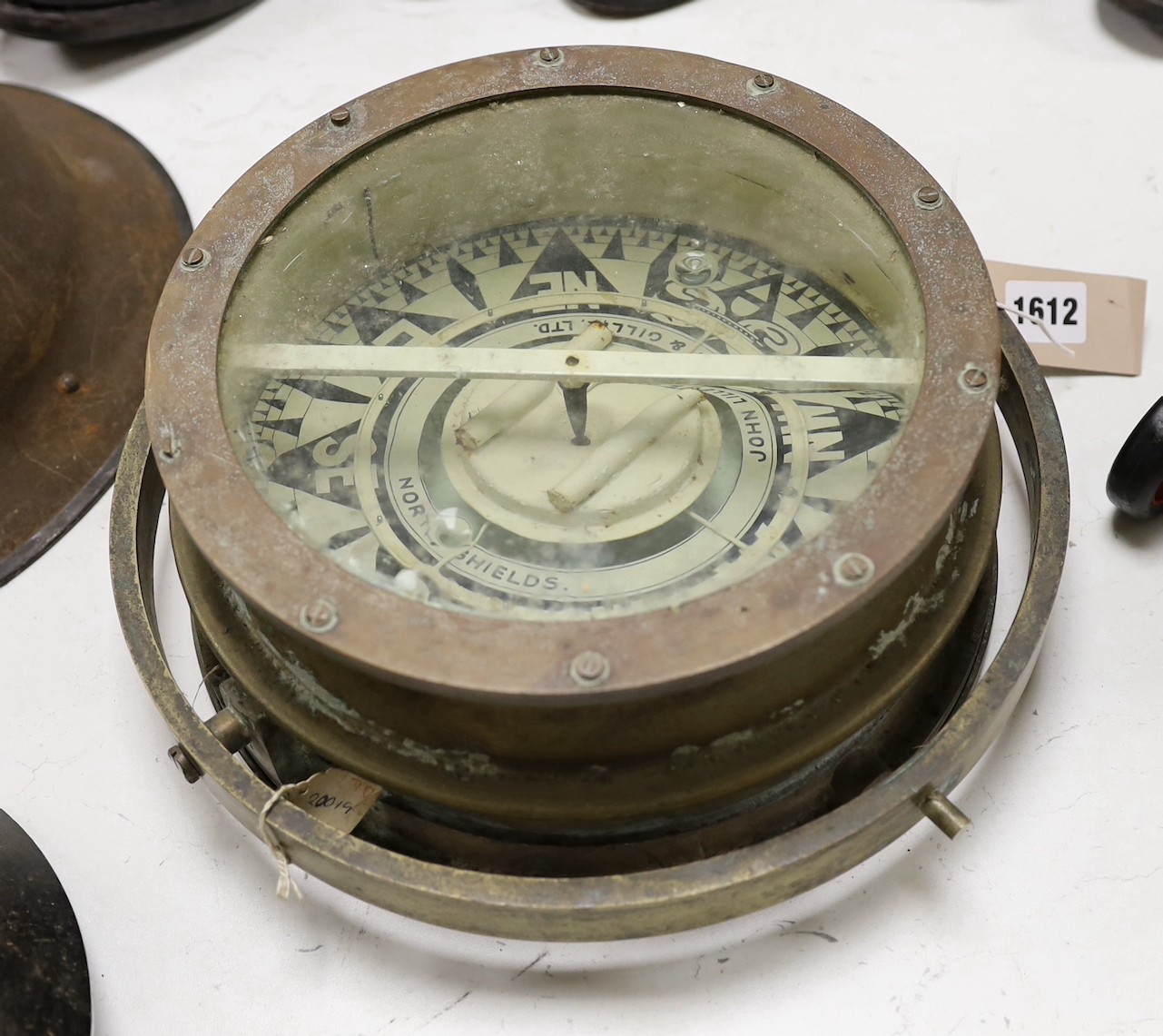 A John Lilley & Gillie ship's brass water compass, 31cm diam.